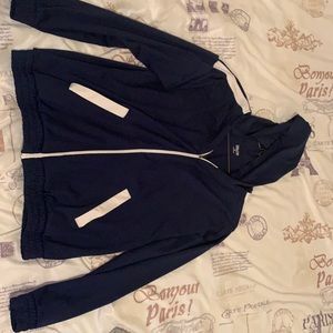 a blue zip up jacket
